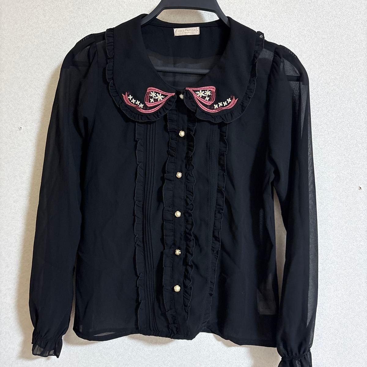 women's axes frill blouse long sleeve black embroidered round neck
