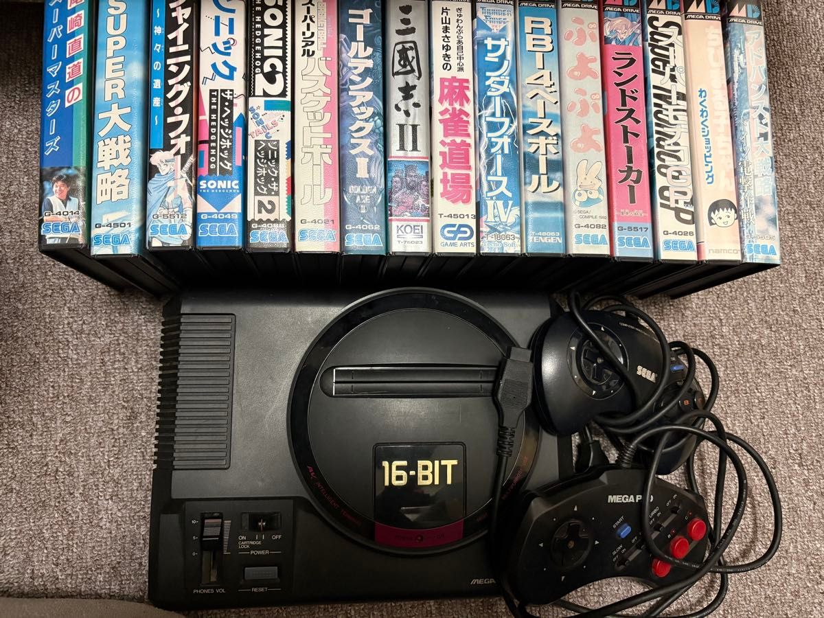 Functionality unconfirmed, sold as junk SEGA Mega Drive 16-BIT Console, 2 controllers, 16 game cartridges