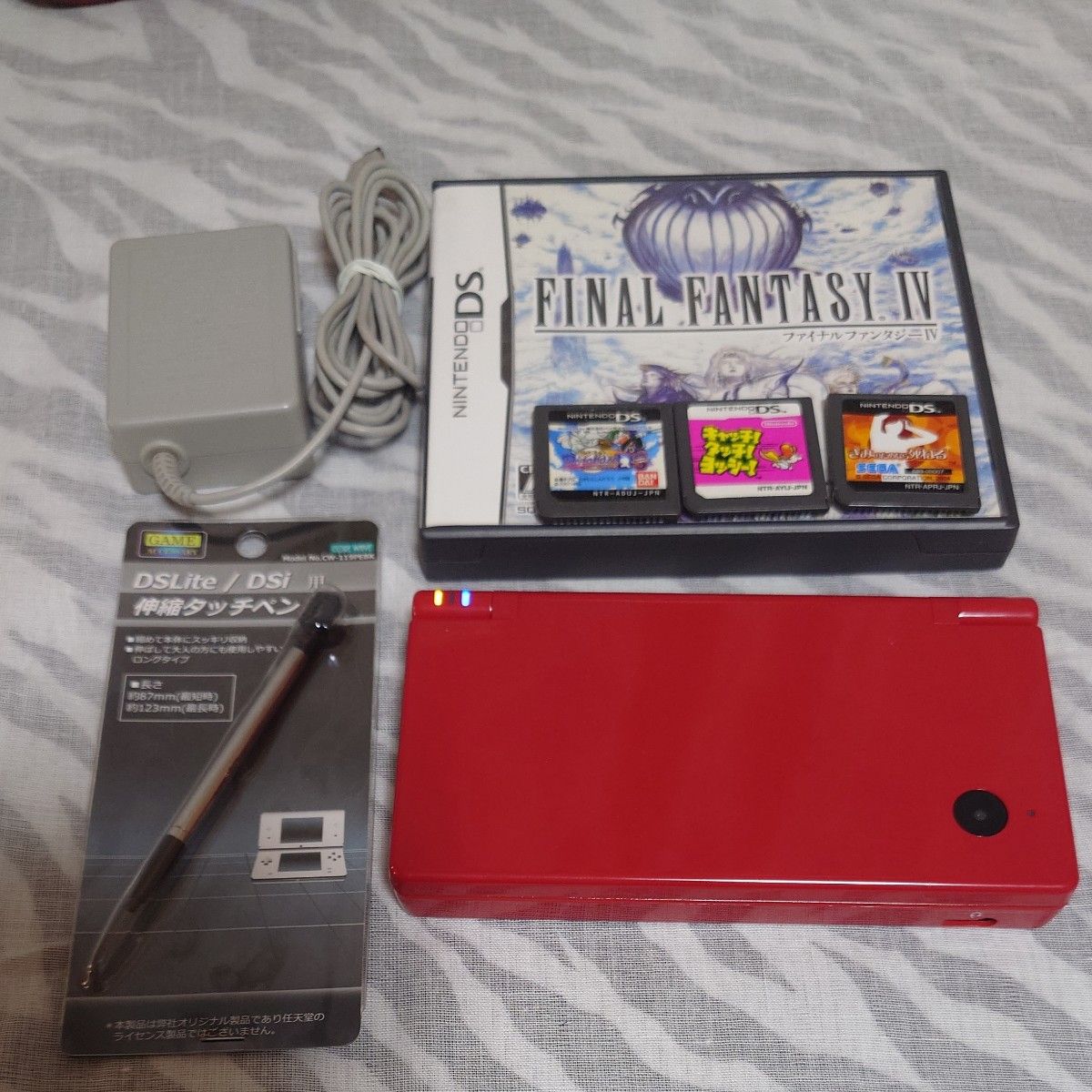 [Free Shipping] Nintendo Nintendo DSi Red Console, AC Adapter, 4 Software Titles, and Stylus Set – Final Fantasy IV