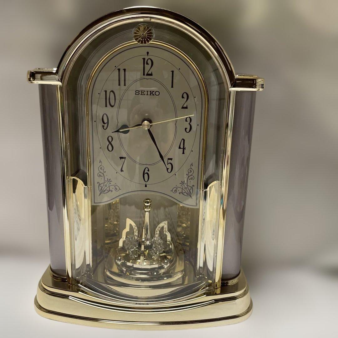SEIKO table clock with rotating ornament, interior decoration, new and unused.