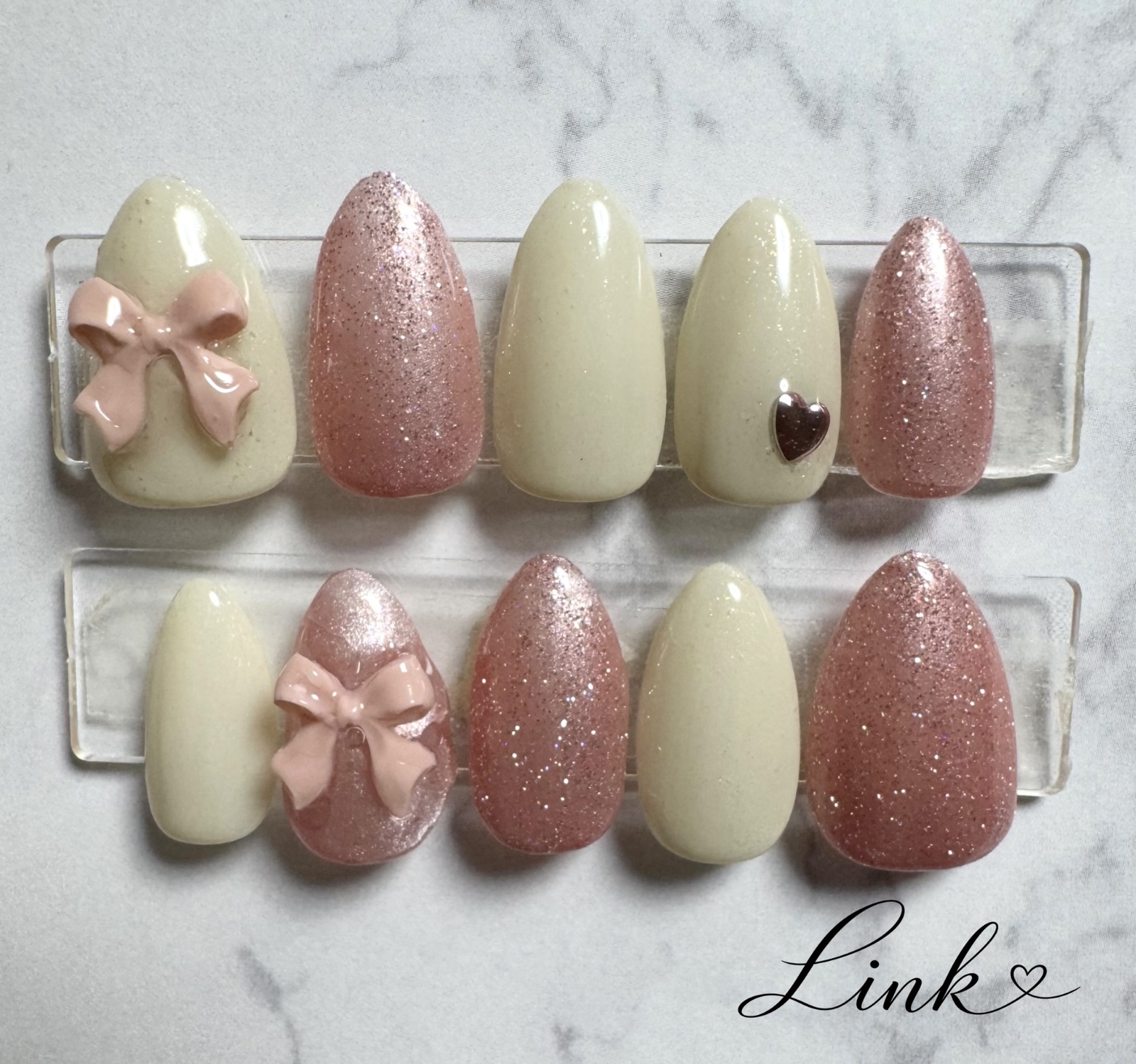 In-stock item: Pearl white, flash magnet pink ribbon nail tips, girly style.