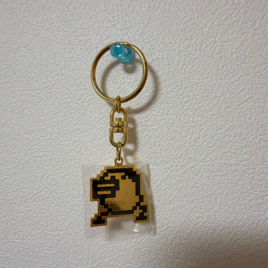 1997 Tamagotchi Tarakotsu Metal Keychain BANDAI