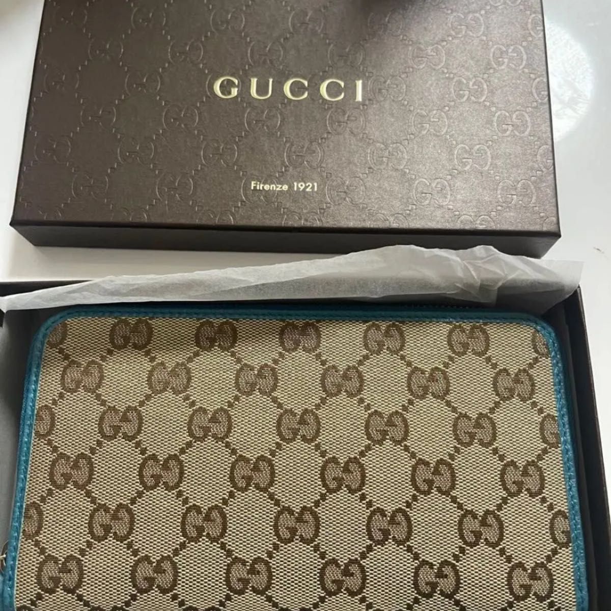 Unused GUCCI long wallet with zipper