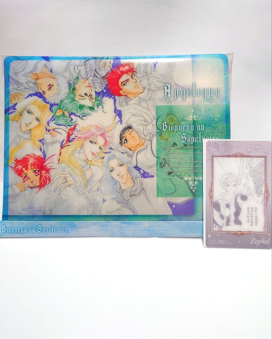 Two Angelique Divine Bird merchandise items illustrated by Yura Kairi, Neo Romance random trading cards
