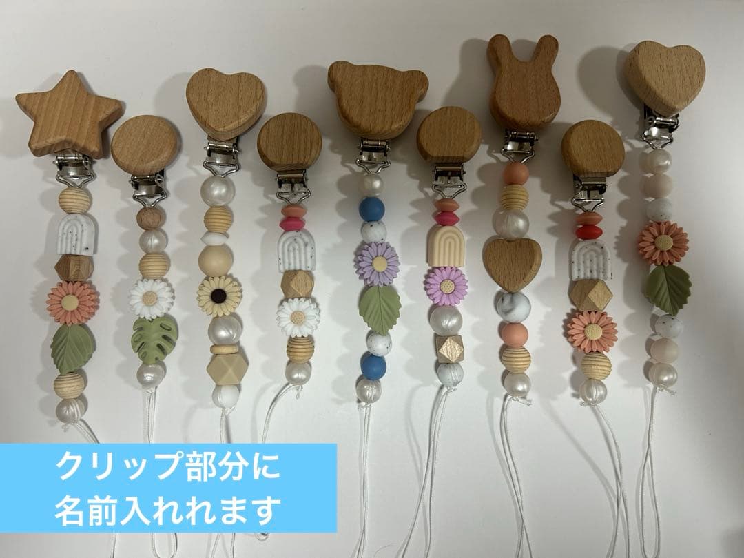 Multi-clip pacifier holder, baby product