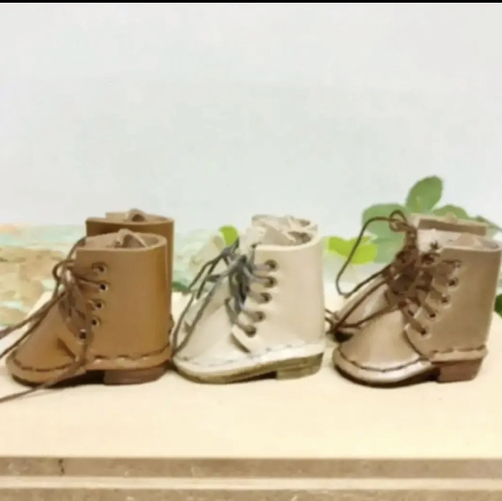 皮革工艺 长筒靴 一双 迷你款 .