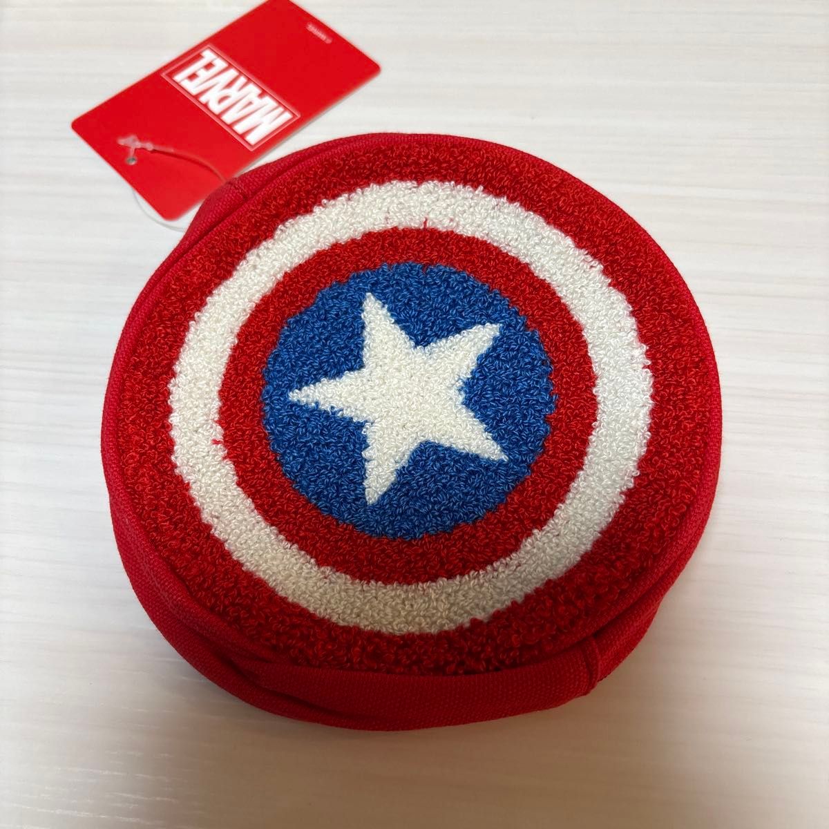 Unused new item: Marvel Captain America round pouch with paper tag