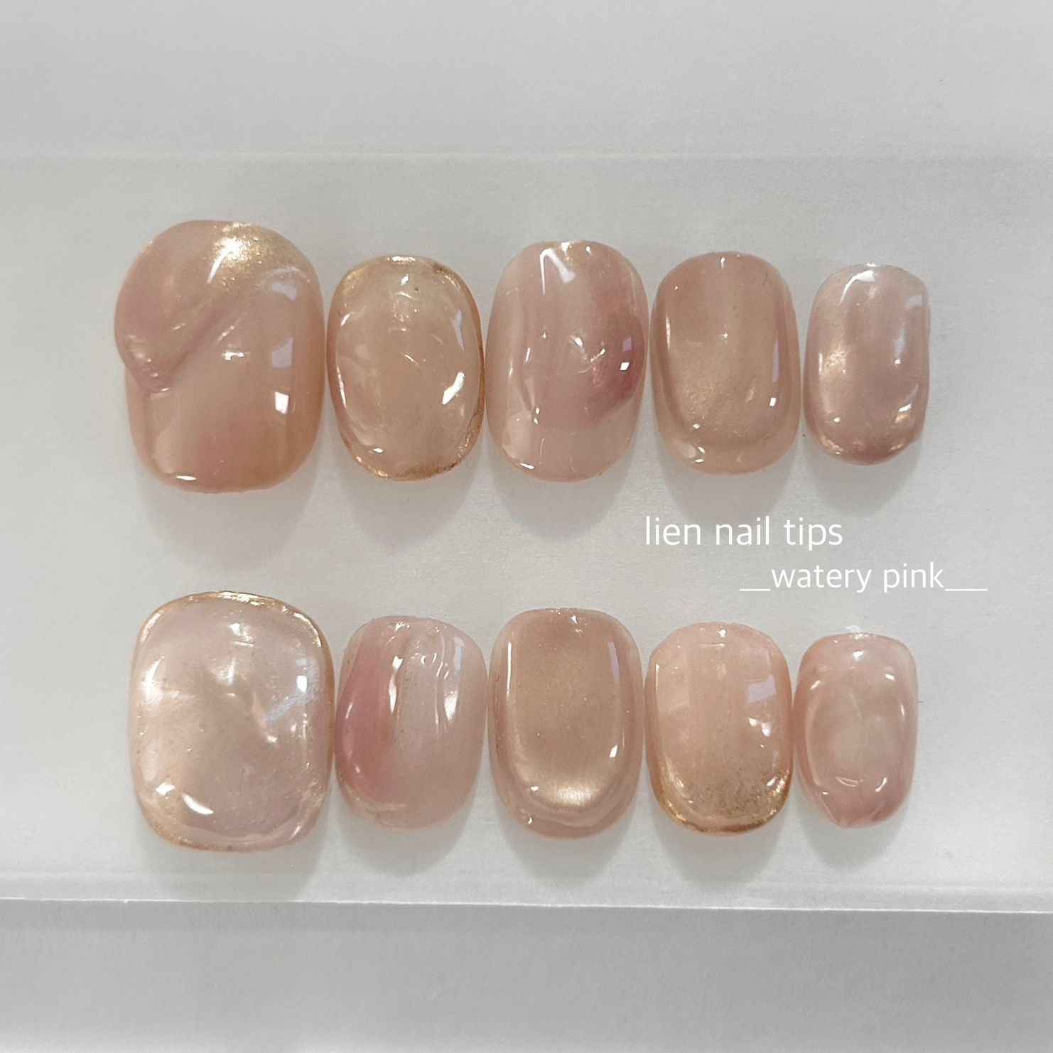 Watery pink nail tip