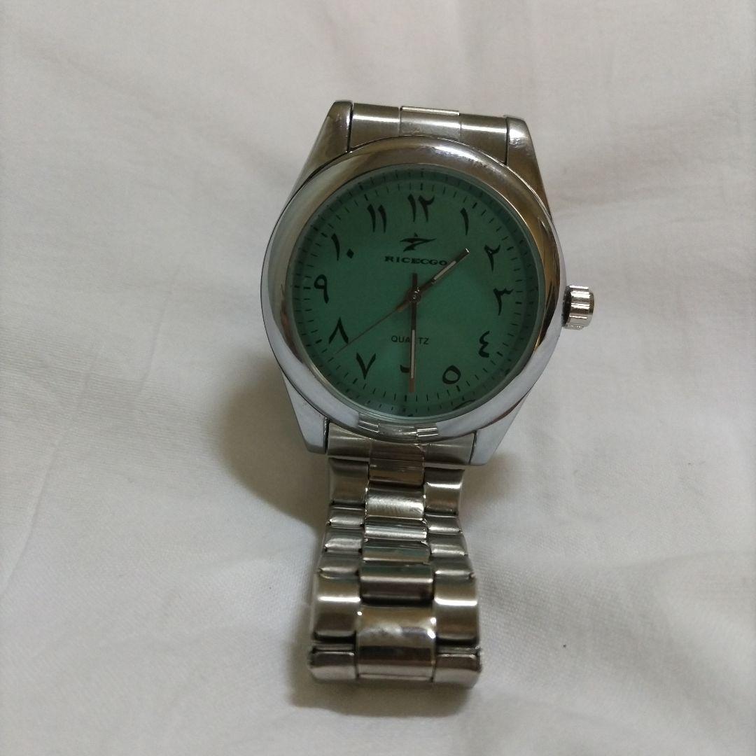 “Junk item (light blue dial wristwatch), for parts only” – Eastern Arabic numerals