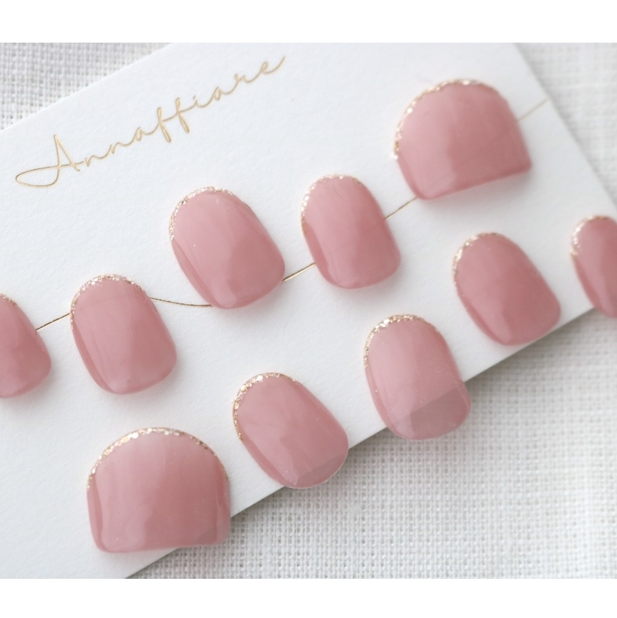 Apricot-pink nail tips with glitter at the tips and holographic accents/Annaffiare viper‑style nails, suitable for the office, simple designs, weddings, and traditional Japanese attire.
