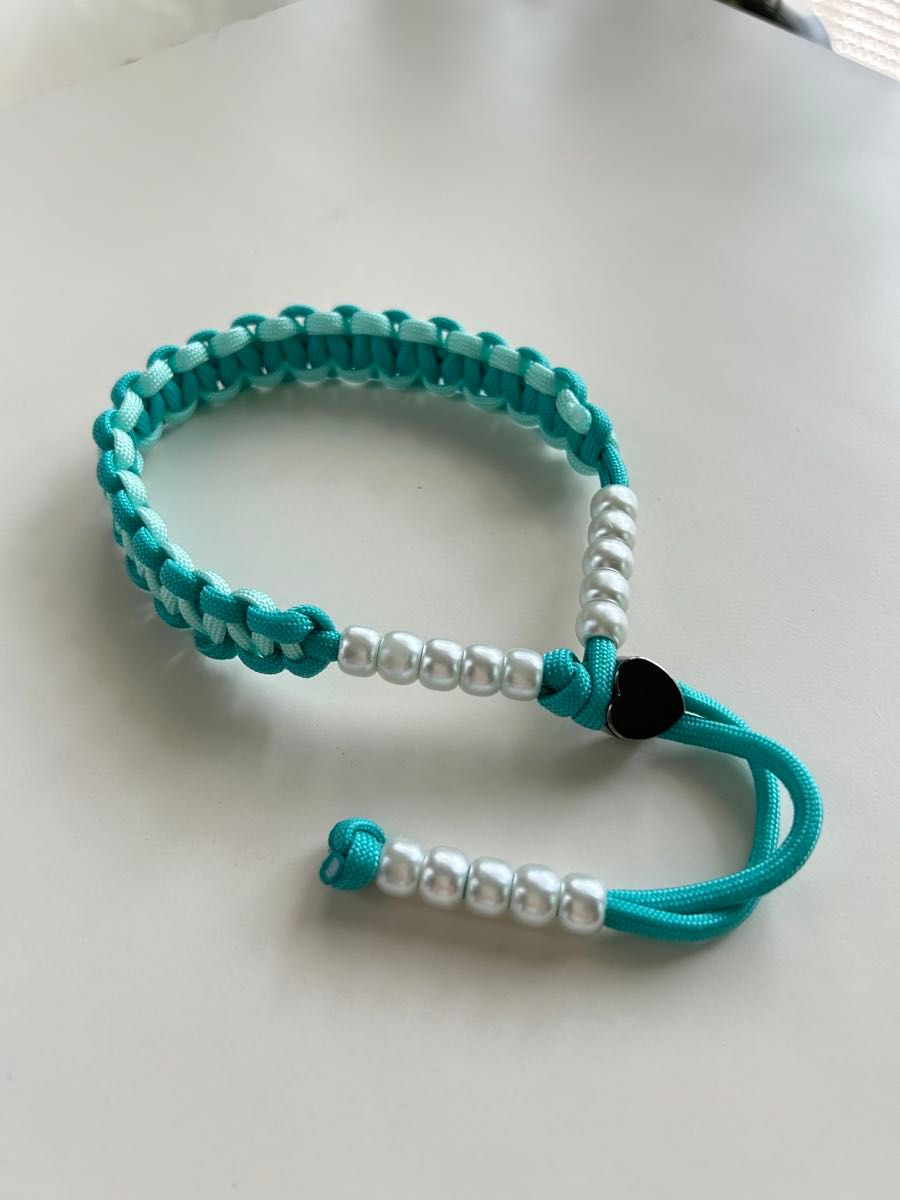 ハンドメイド パラコード ハンドストラップ パール付き ターコイズブルー