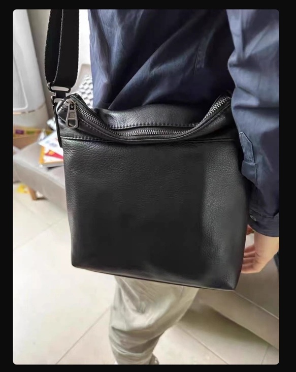 男士的真皮个性斜挎包，头层牛皮单肩包，休闲简约跨包，韩版真皮竖款包包。