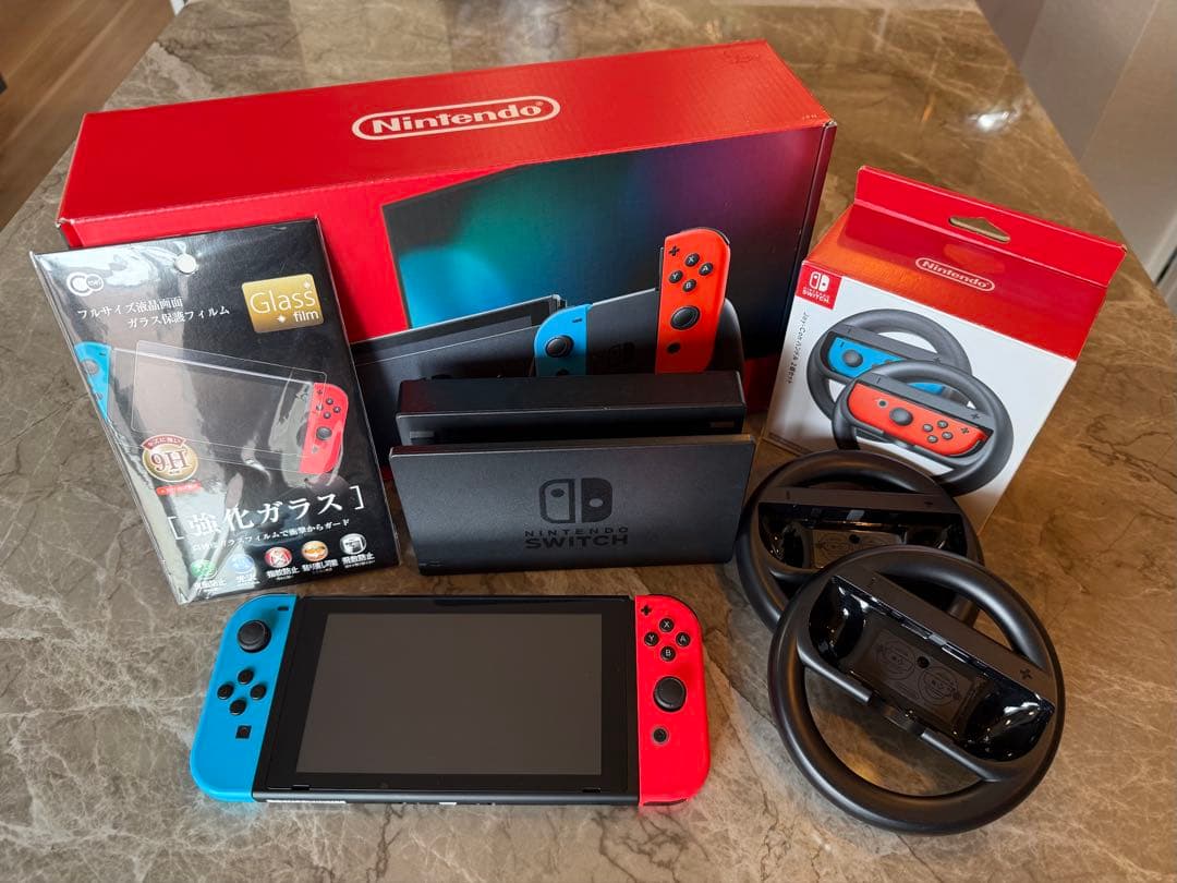 任天堂Switch主机标准版 带包装盒 带保护壳 附原装手柄2个