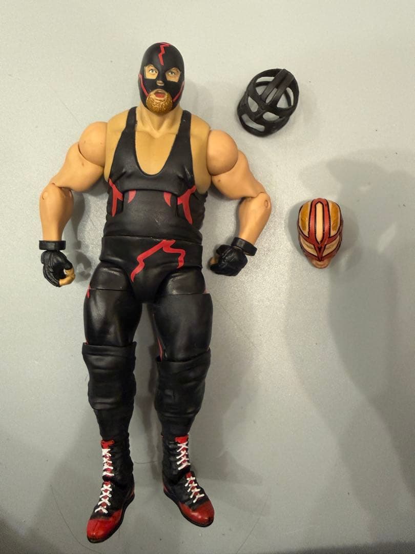 WWE Figure with Two Black and Red Masks