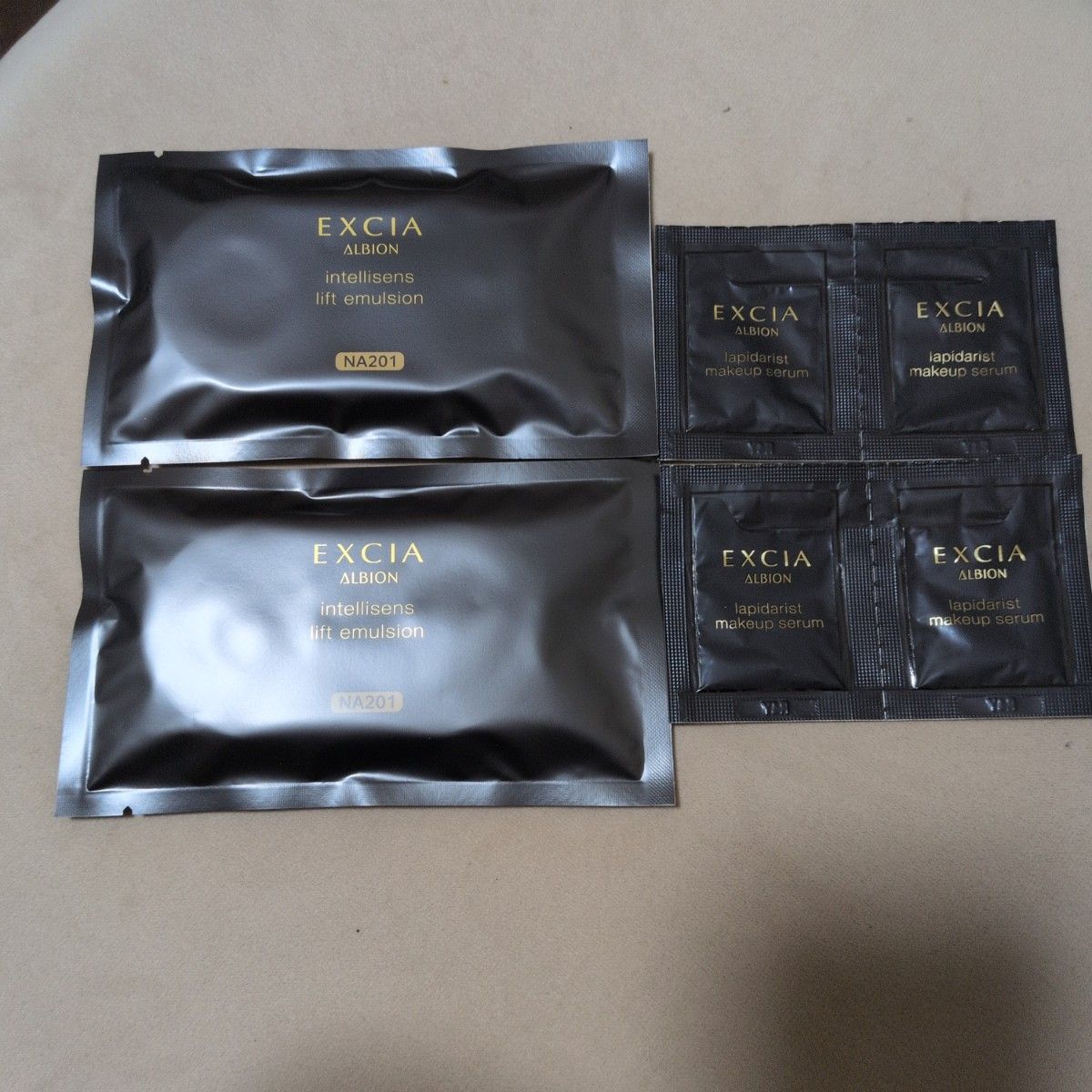 雅诗兰黛 艾诗缇 抗老提升乳液 NA201 & 拉皮达利彩妆精华 润色试用套装