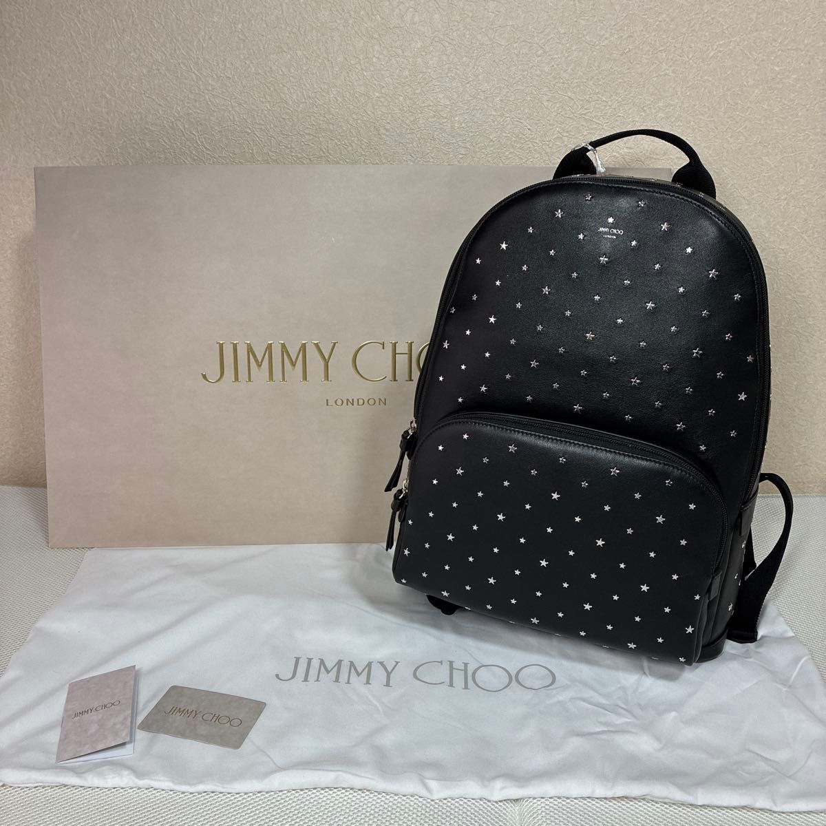 定价七折【全新未使用】Jimmy Choo 平底星形铆钉皮革双肩包 黑色