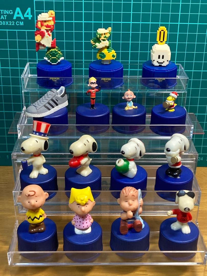 Snoopy Pepsi Bottle Cap Figure Set with 15 Additional Items