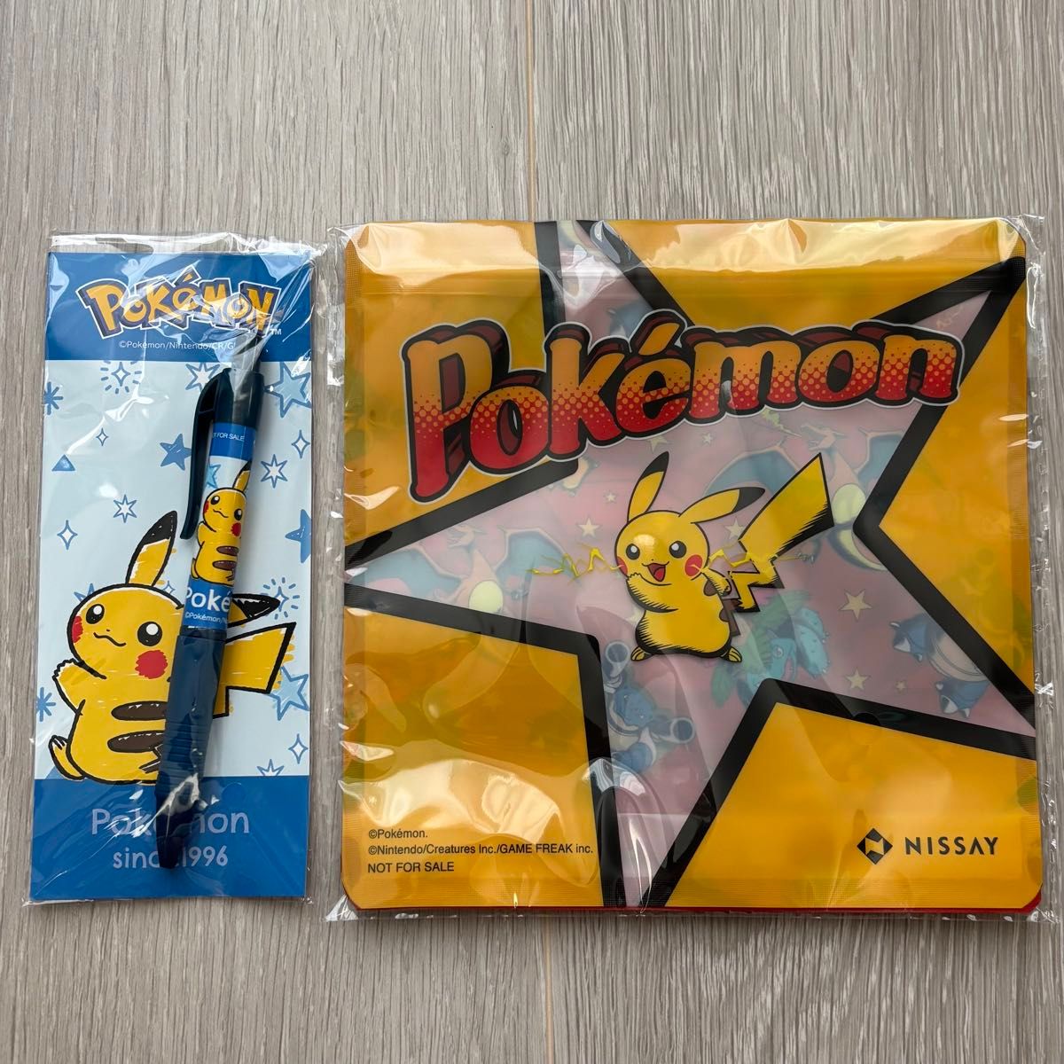 神奇宝贝尼西非卖品皮卡丘圆珠笔带火柴拉链包2件套装