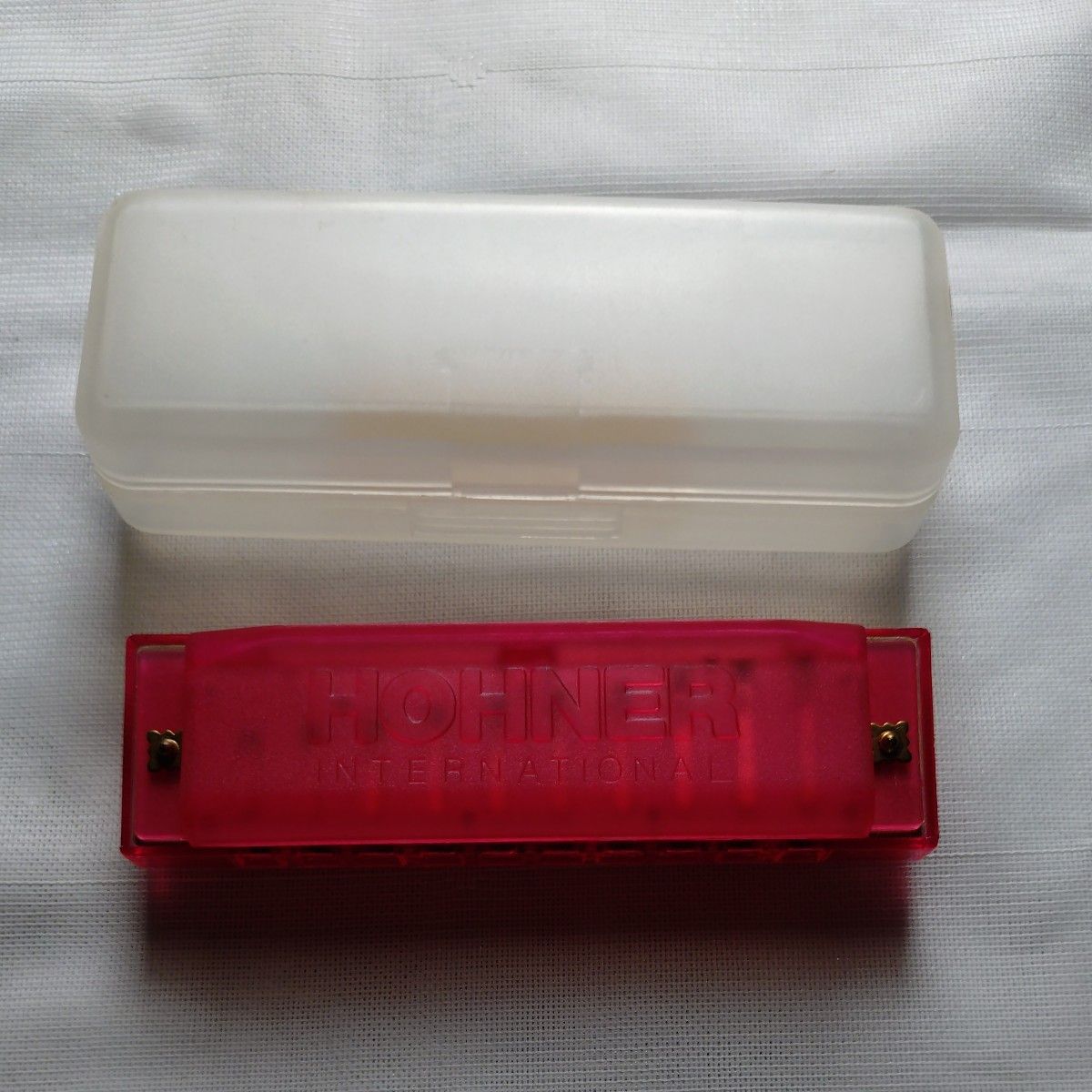 ○ 带HOHNER INTERNATIONAL口琴红盒