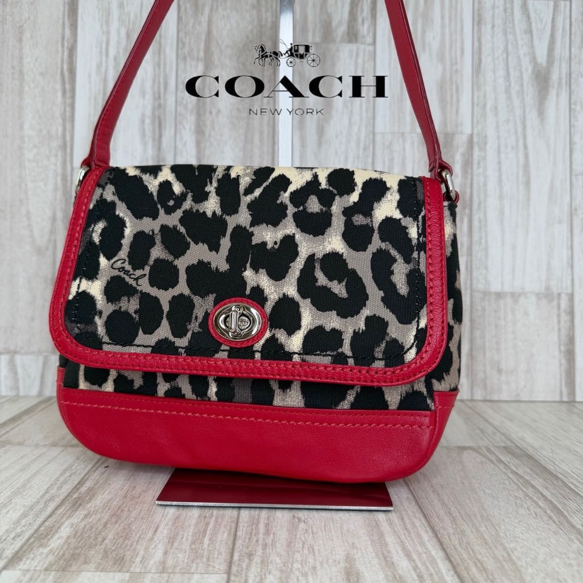 COACH教练豹纹挎包50
