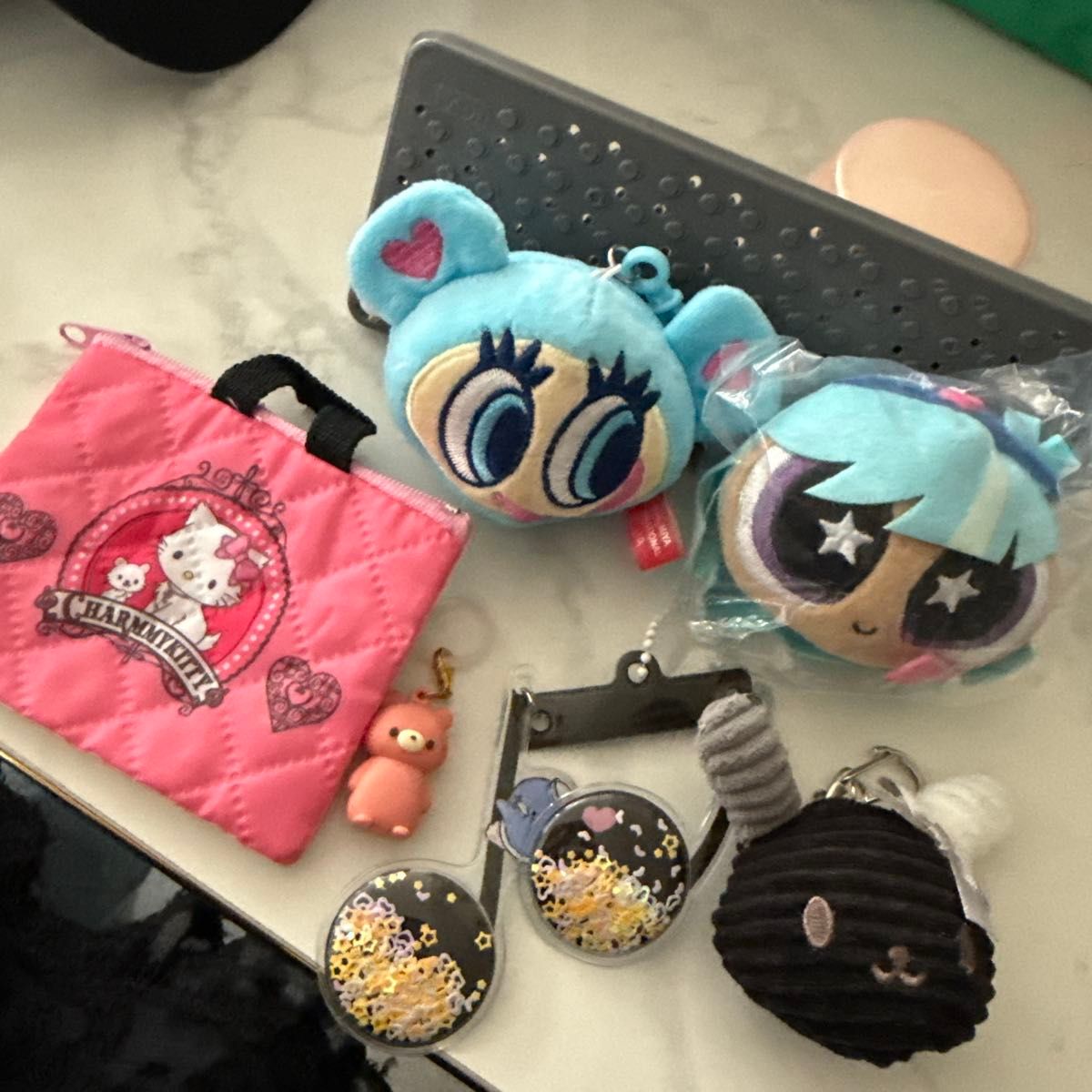 Sanrio Charming Kitty pouch, plush toy, and keychain—sold as a set.