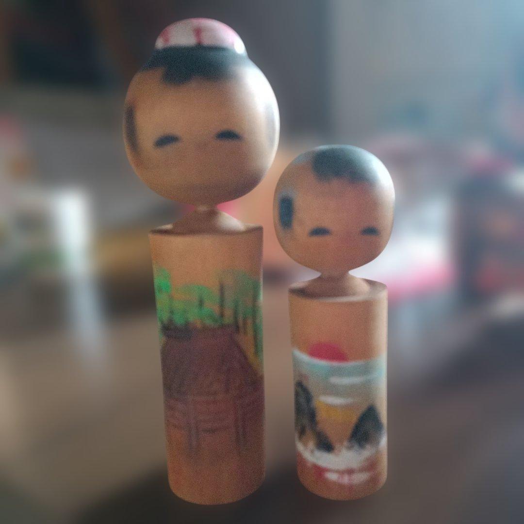 Set of Two Original Kokeshi Dolls, Wood-Carved Figurines with Landscape Motifs