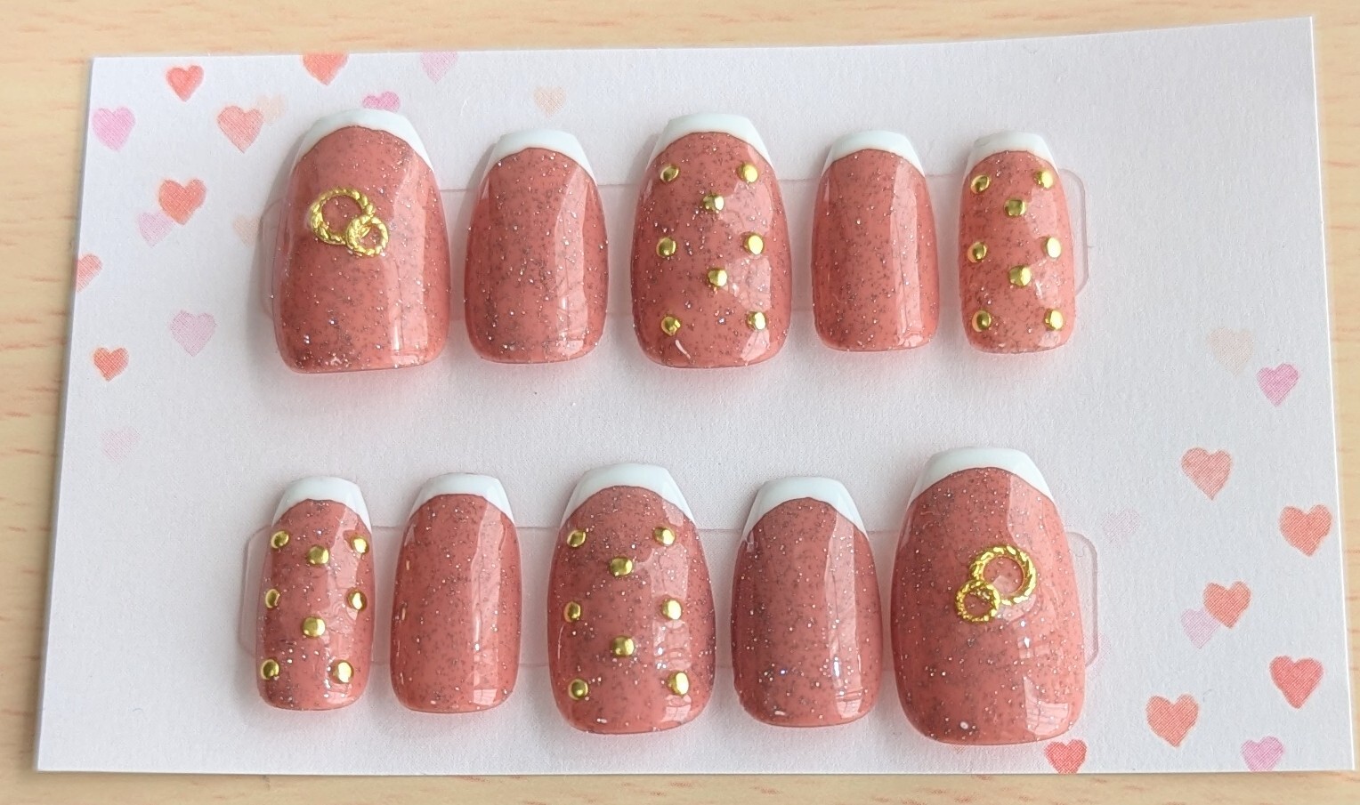 Sparkly gold French nail tips