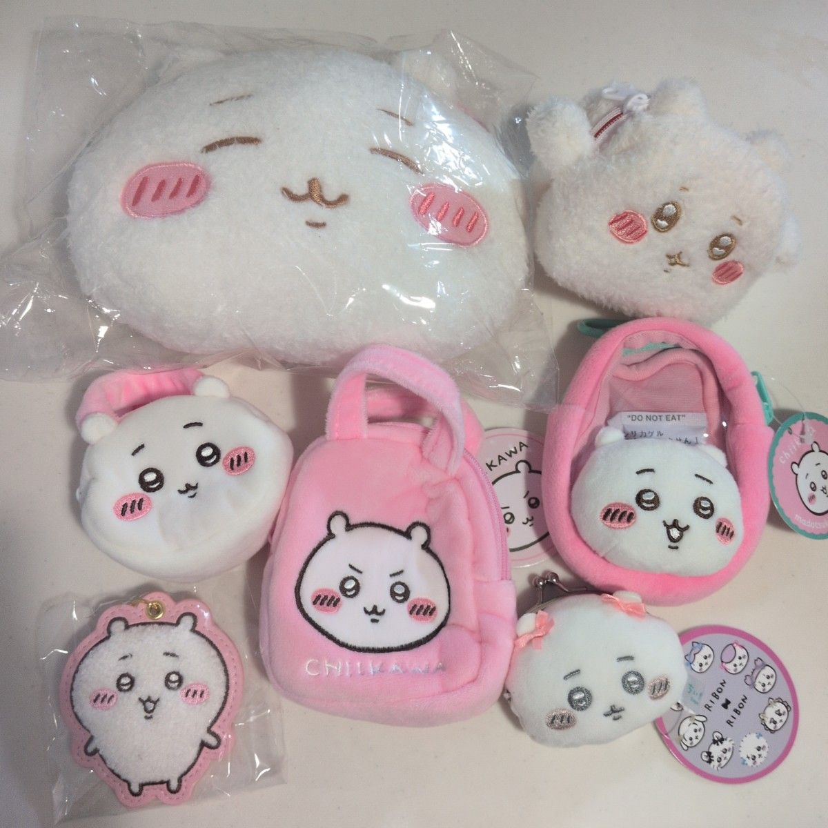 Chiikawa goods bundle sale: 7-piece set including plush toys, pouches, and keychains, with tags.