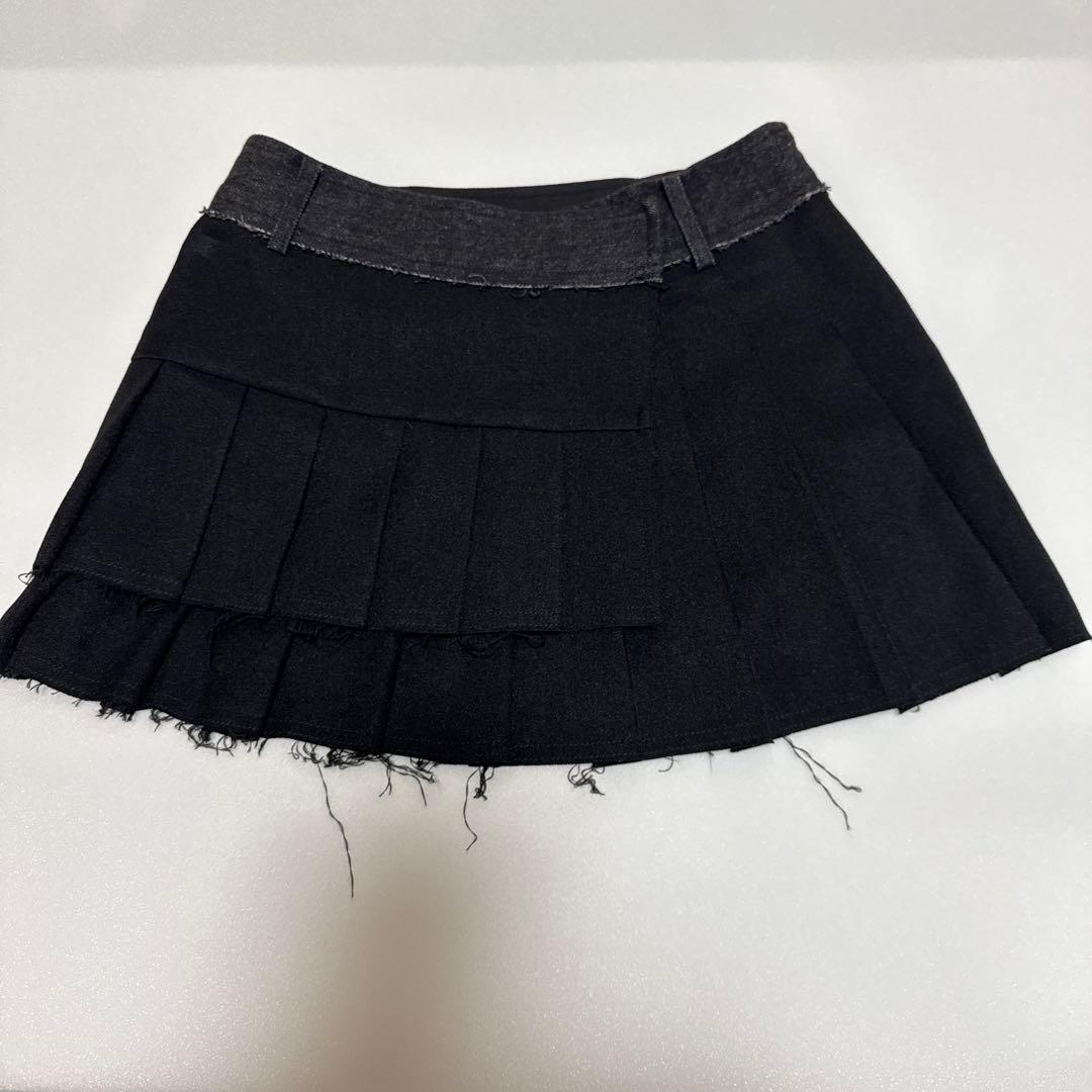 黑色牛仔百褶迷你裙 剪裁边