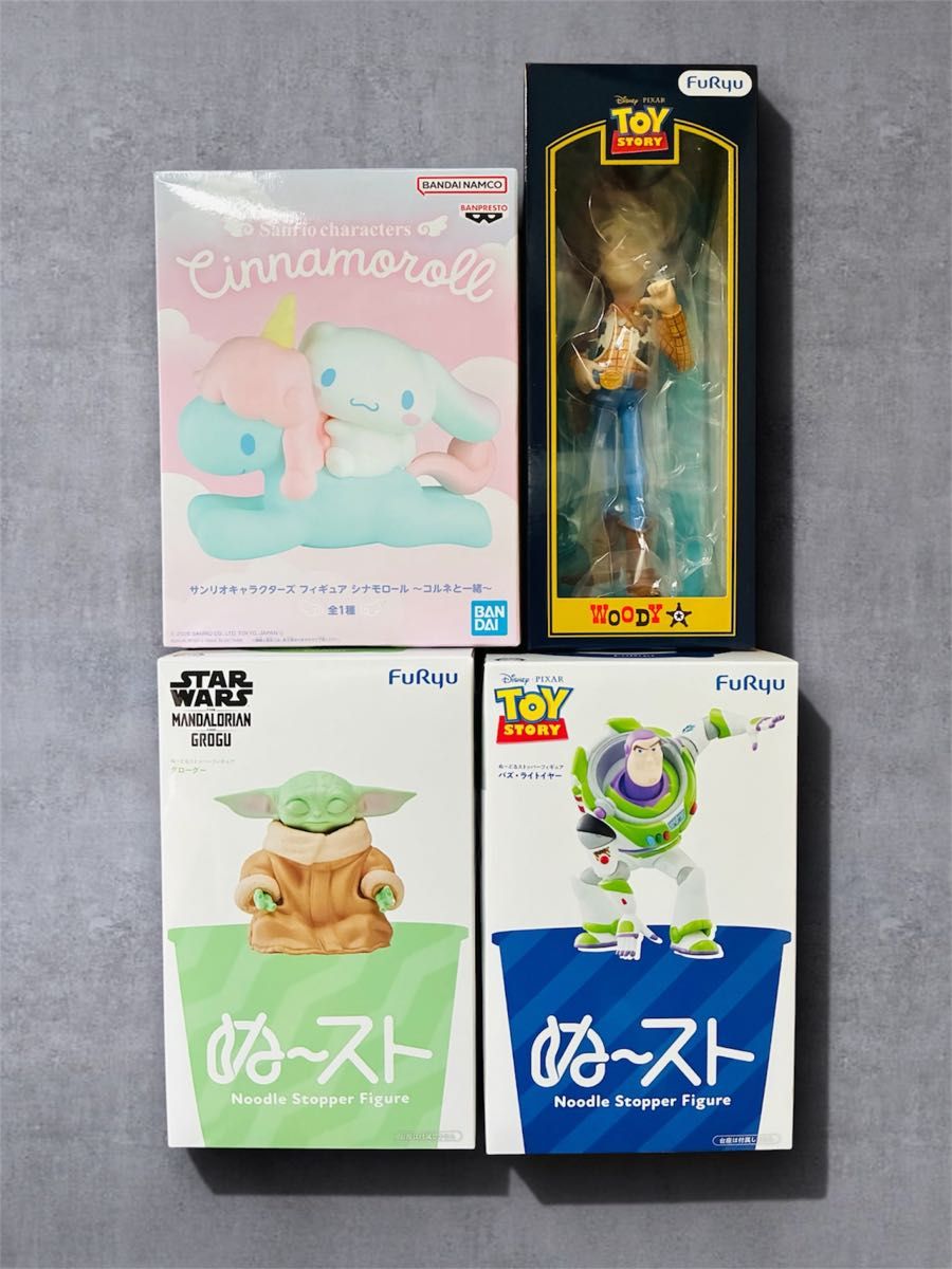 Figure 4-Piece Set: Cinnamoroll, Woody, Buzz Lightyear, and Grogue