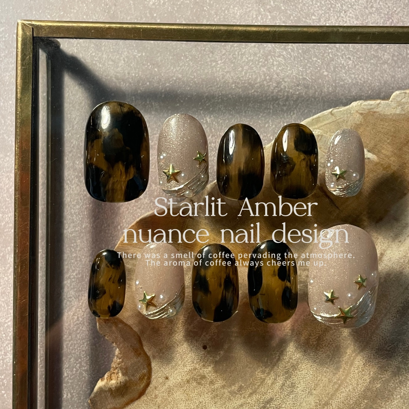 Adult-style tortoiseshell-inspired nail tips with dancing pearls and stars