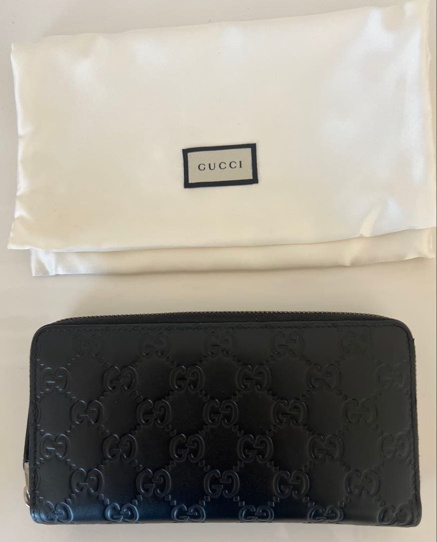 GUCCI 古驰 长款钱包 GG 压花 圆形拉链 黑色