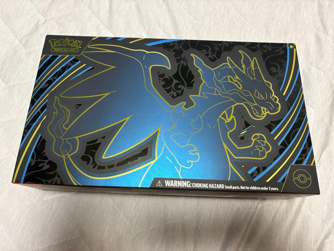 Opened Pokemon card Mega Charizard X ex
