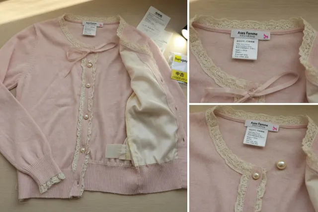 Pre-owned axes femme cardigan with lace trim, buttons, and care label photographed for condition review