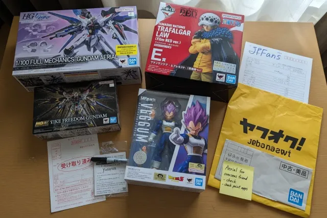 Premium Bandai items from Japan including collectible figures, model kits, and character goods in retail packaging