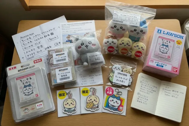 A display of Chiikawa plush, acrylic stands, keychains, and Japanese store-exclusive merchandise