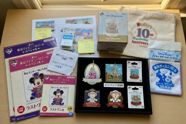 Rare Tokyo Disney Resort goods, Disney pins, and sealed Ichiban Kuji prizes arranged for a Japanese Disney collection