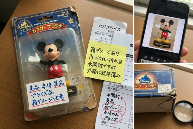Close-up of Japanese Disney figure packaging showing condition notes and a Disney collectible with box damage