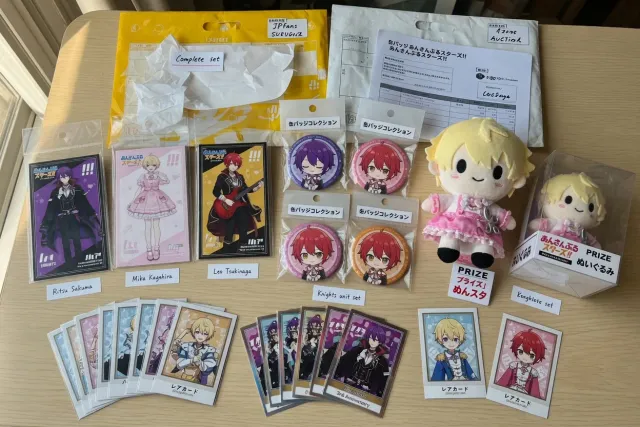 Ensemble Stars!! acrylic stands, can badges, plush nui, and collectible cards arranged by character