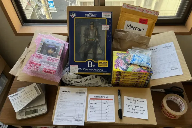 Packed JoJo's Bizarre Adventure figures and manga prepared for worldwide shipping from Japan