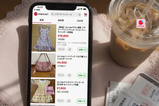 Japanese Mercari listing prices for Liz Lisa bags and dresses on a smartphone screen