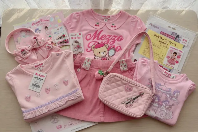 Pastel pink Mezzo Piano clothing, bags and hair accessories arranged for mezzo piano shopping from Japan
