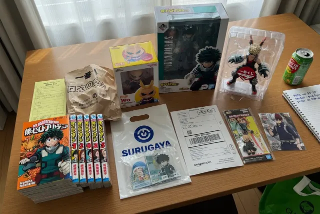 My Hero Academia manga volumes, figures, and character merch arranged for anime collectors