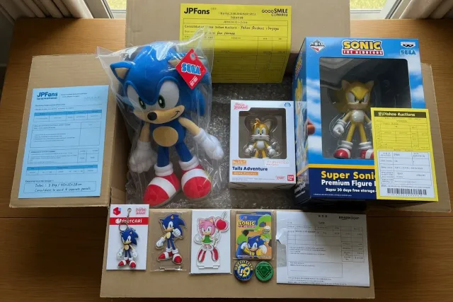 Consolidated Sonic the Hedgehog merchandise order with plush toys, boxed figure, and small character goods prepared for shipping
