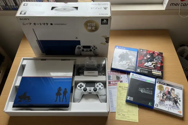 Limited-edition PlayStation console with matching controller, original box and Japanese PlayStation games