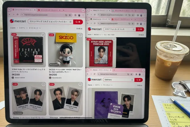 Stray Kids Japanese merchandise listings showing albums, photocards, and SKZOO goods on a shopping screen