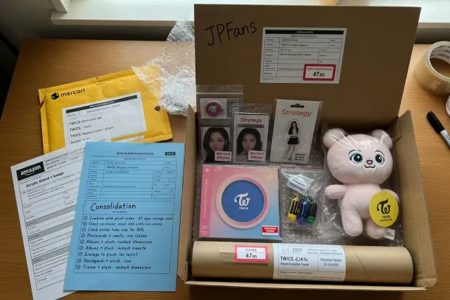 Several TWICE purchases from Japan being grouped together for international shipping