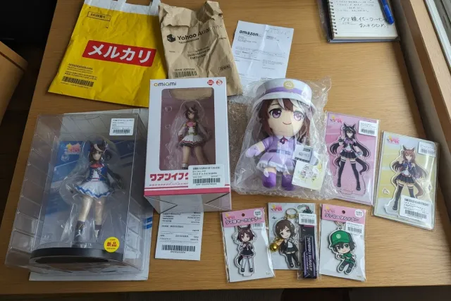 Umamusume: Pretty Derby merchandise from Japan, including character figures, acrylic stands, and plush toys